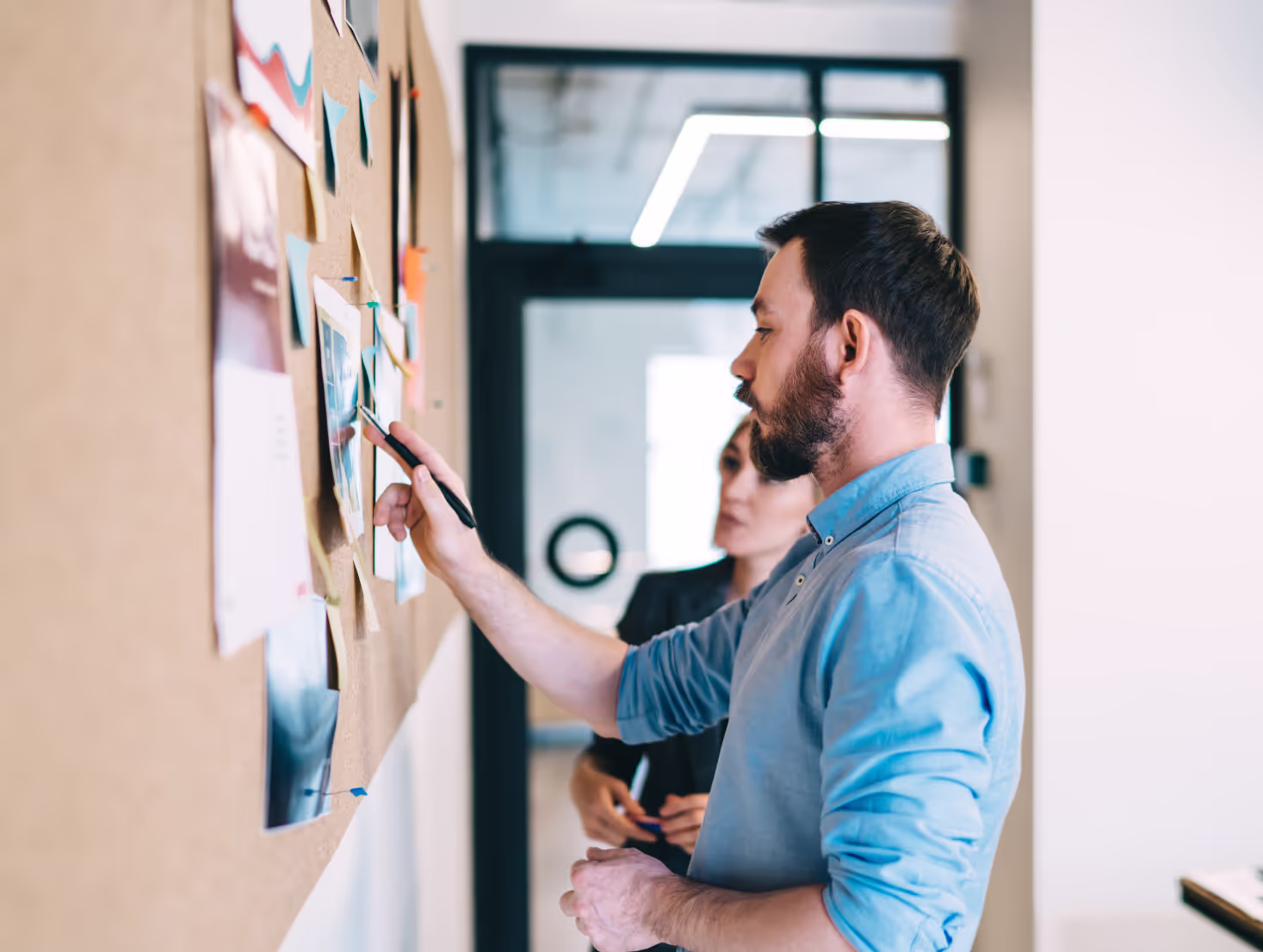 A leader mapping a plan on a board